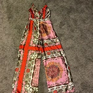 Satin v neck spaghetti strap printed jumpsuit with wide leg